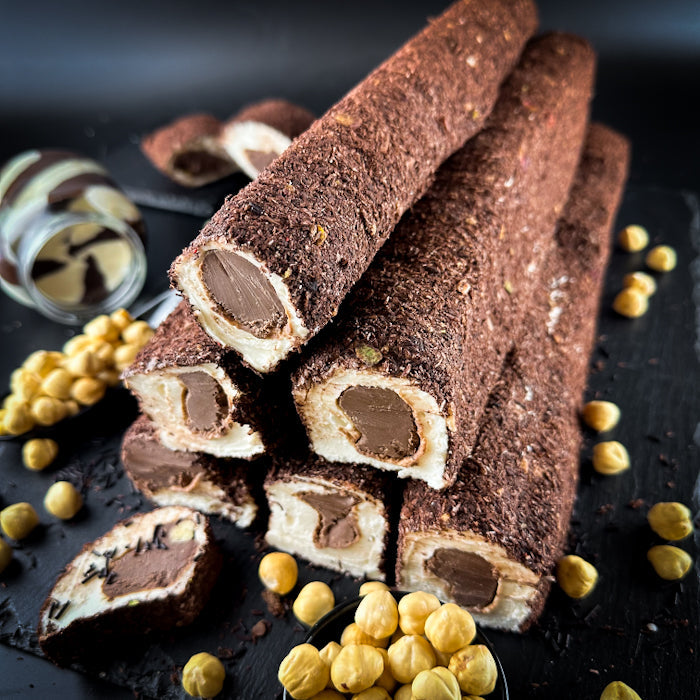 Piena-vaniļas lukums ar "nutella" krēmu, lazdu riekstiem un šokolādes skaidiņām