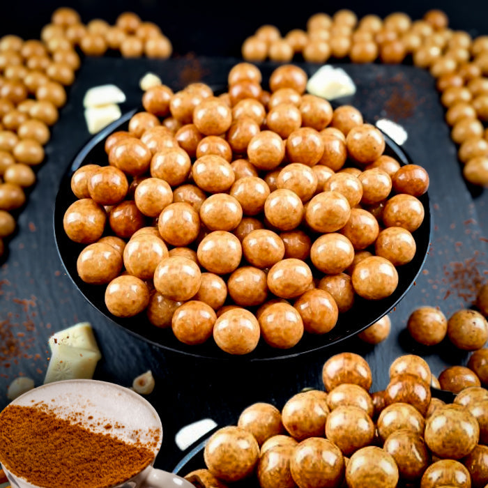 Tiramisu dražejas ar lazdu riekstiem baltā beļģu šokolādē